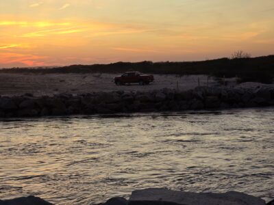 a car parked on a rocky shore (MyCoast AI)