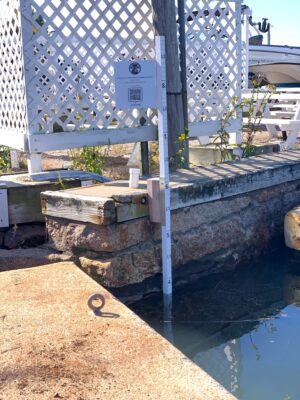 a water fountain with a metal fence (MyCoast AI)